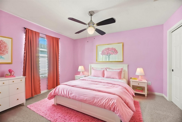 carpeted bedroom with ceiling fan