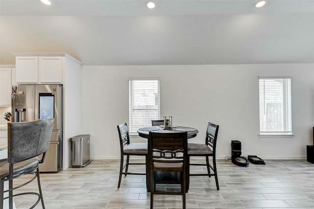 dining area with plenty of natural light