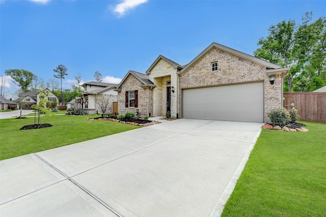 view of front facade with a garage and a front yard