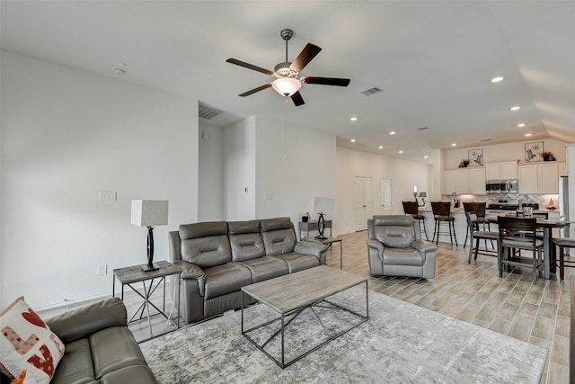 living room featuring ceiling fan