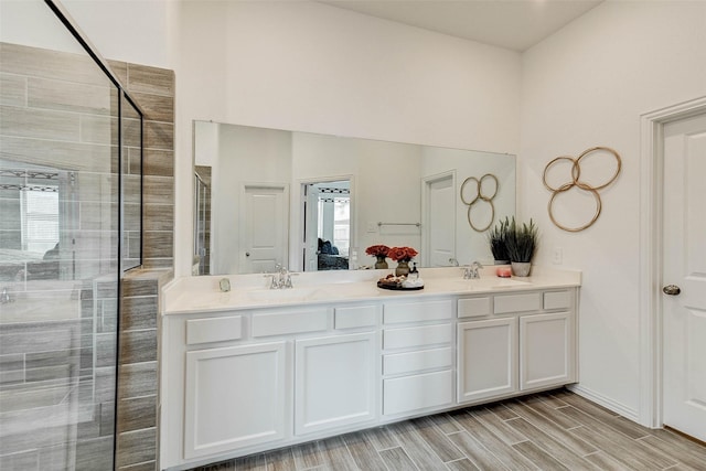 bathroom featuring vanity and walk in shower