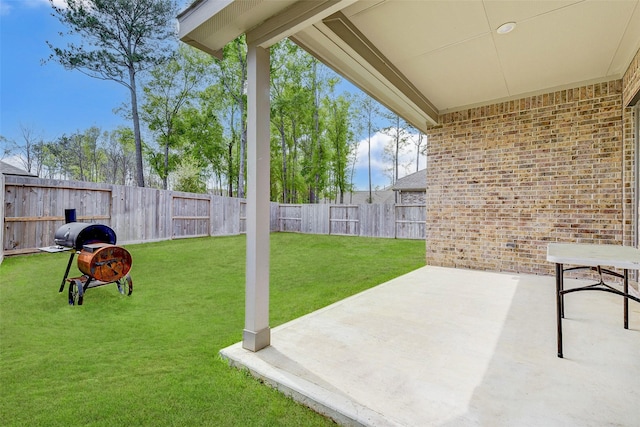 view of patio featuring a grill