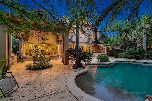 view of pool featuring a patio