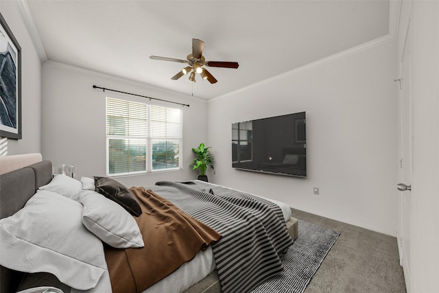 carpeted bedroom with ceiling fan and crown molding