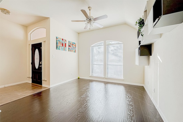 unfurnished living room featuring wood-type flooring and ceiling fan