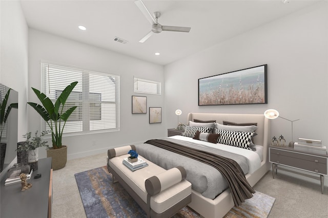 carpeted bedroom featuring ceiling fan and multiple windows