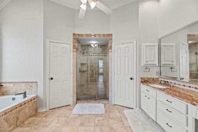 bathroom featuring vanity, ceiling fan, crown molding, and shower with separate bathtub