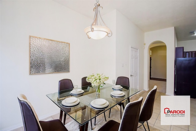 dining space with light tile patterned flooring