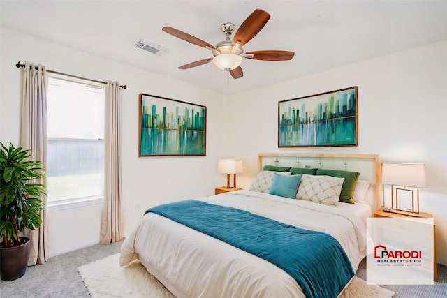 carpeted bedroom featuring ceiling fan