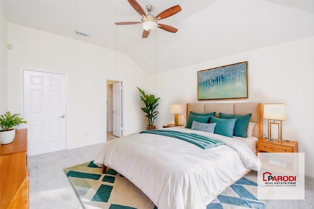 carpeted bedroom featuring ceiling fan and lofted ceiling