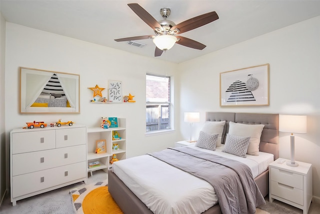 bedroom featuring ceiling fan and light colored carpet