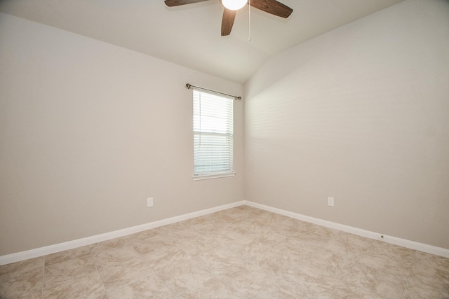 spare room with ceiling fan and lofted ceiling