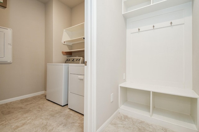 laundry room featuring washing machine and clothes dryer