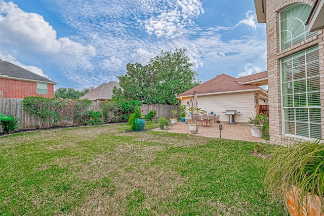 view of yard with a patio area