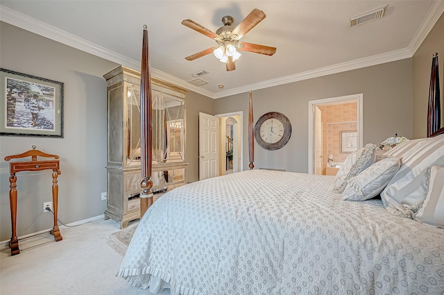 carpeted bedroom with ensuite bath, ceiling fan, and ornamental molding