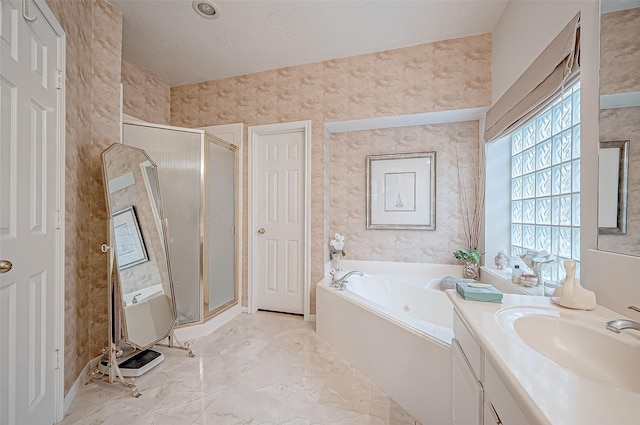 bathroom featuring vanity and separate shower and tub