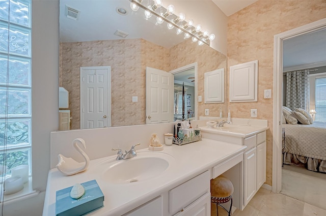 bathroom featuring vanity and tile patterned floors