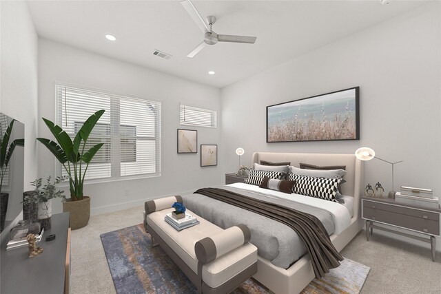 bedroom featuring carpet, ceiling fan, and multiple windows