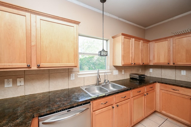 kitchen featuring dishwasher, light tile patterned floors, decorative light fixtures, and sink