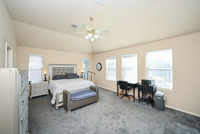 bedroom featuring ceiling fan, carpet floors, and vaulted ceiling