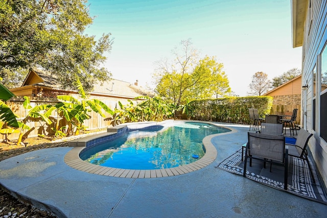 view of pool with a patio area