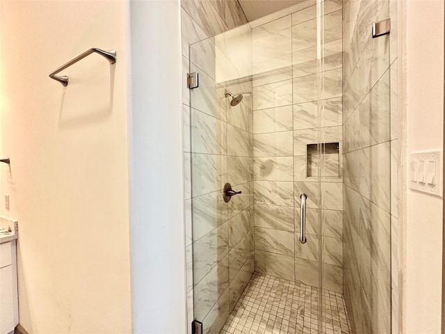 bathroom featuring an enclosed shower