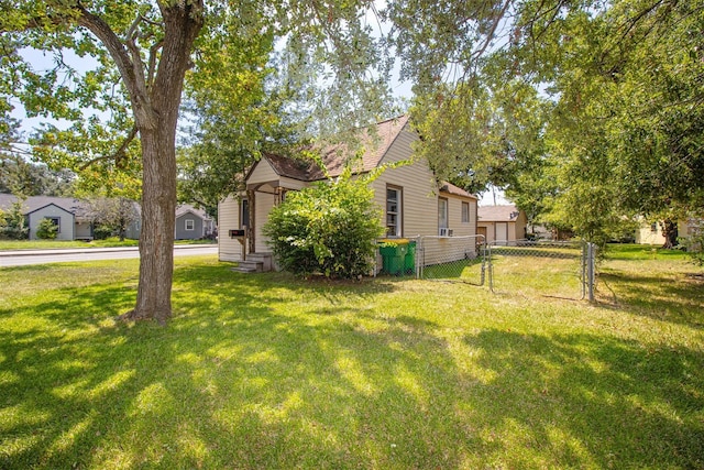 view of home's exterior with a lawn