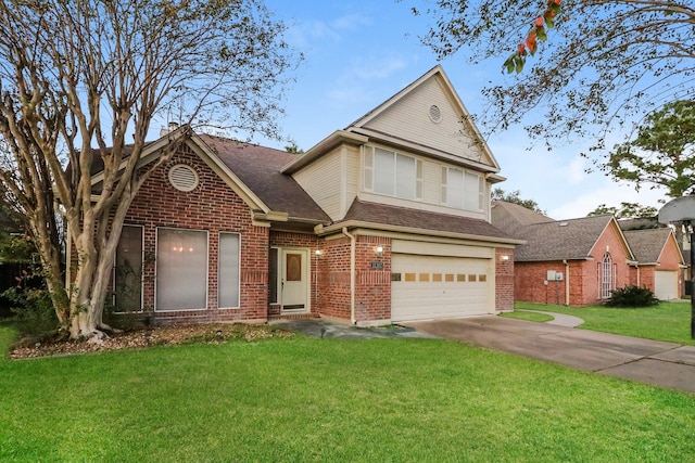 view of front of home with a front yard and a garage