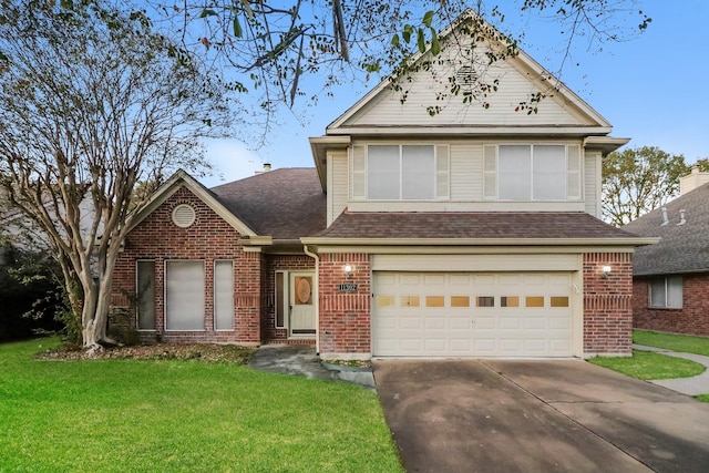 view of front facade with a garage and a front yard