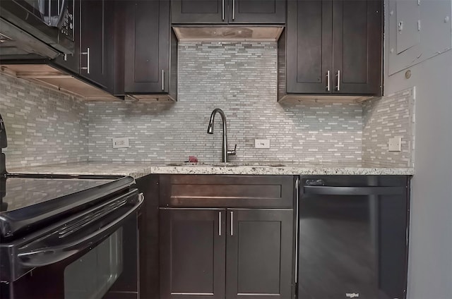 kitchen with dark brown cabinetry, sink, tasteful backsplash, light stone counters, and black appliances