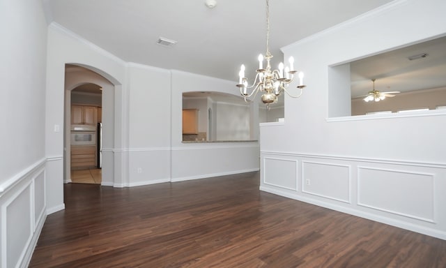 unfurnished dining area featuring dark hardwood / wood-style flooring, ceiling fan with notable chandelier, and ornamental molding