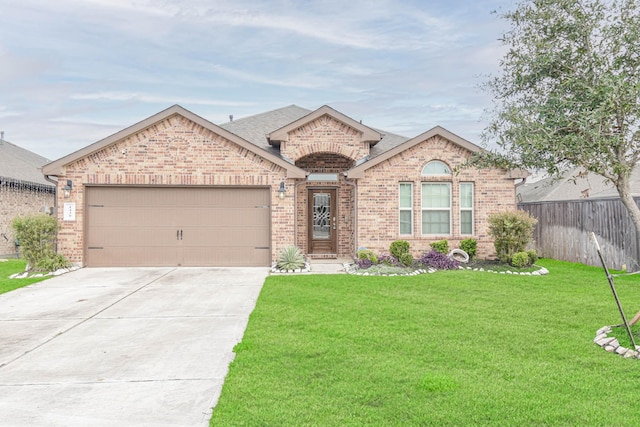 single story home with a garage and a front lawn