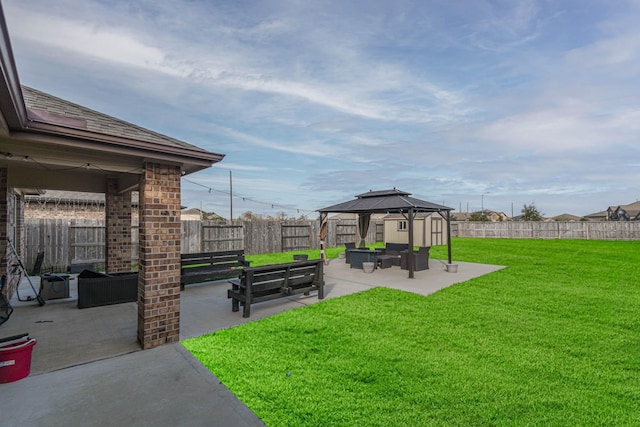 view of yard with a gazebo, an outdoor hangout area, and a patio