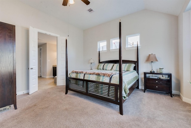 bedroom featuring ceiling fan, lofted ceiling, and light carpet