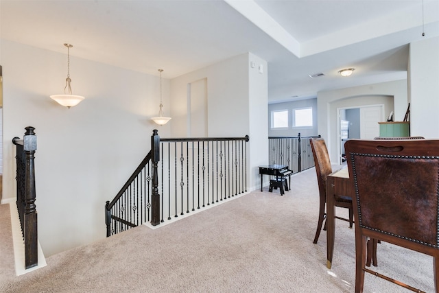 hallway with carpet