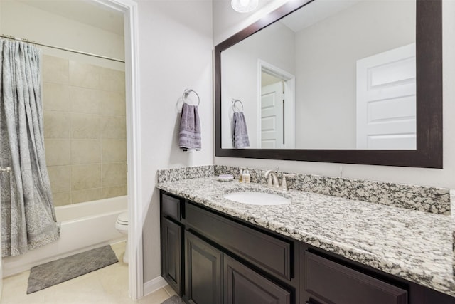 full bathroom featuring toilet, tile patterned floors, vanity, and shower / tub combo with curtain