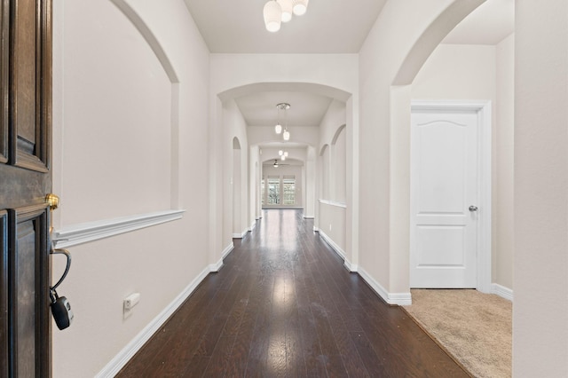 hallway featuring dark hardwood / wood-style floors