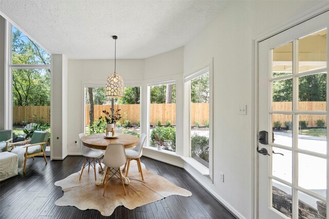 sunroom / solarium featuring a wealth of natural light