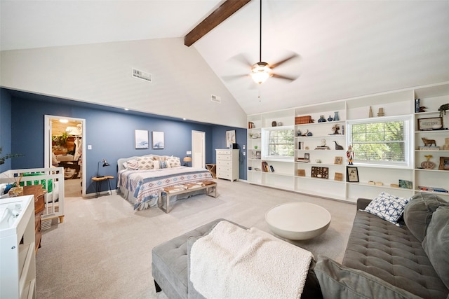 bedroom featuring high vaulted ceiling, a walk in closet, ceiling fan, beam ceiling, and light colored carpet