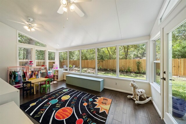 sunroom / solarium with ceiling fan and lofted ceiling