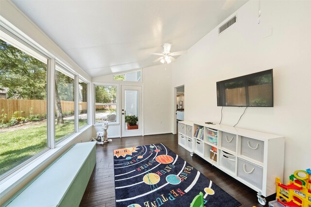 sunroom featuring ceiling fan and lofted ceiling