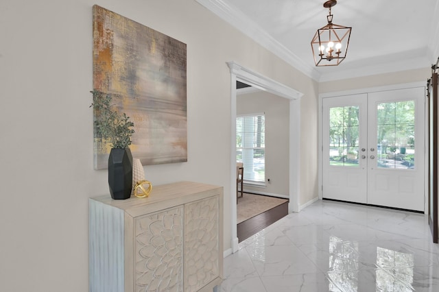 entrance foyer featuring crown molding, light marble finish floors, baseboards, a chandelier, and french doors