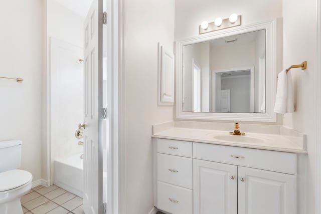 full bathroom with tile patterned floors, bathing tub / shower combination, vanity, and toilet