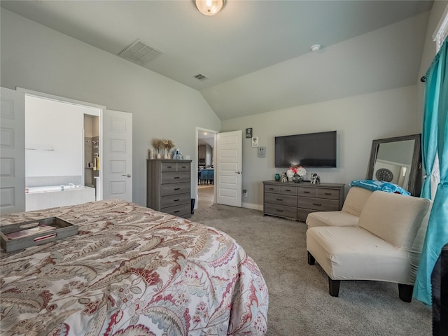 bedroom with light carpet and vaulted ceiling