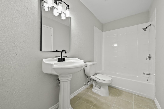 bathroom featuring toilet, bathing tub / shower combination, and tile patterned floors