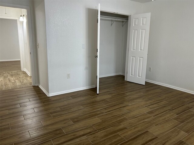 unfurnished bedroom featuring a closet