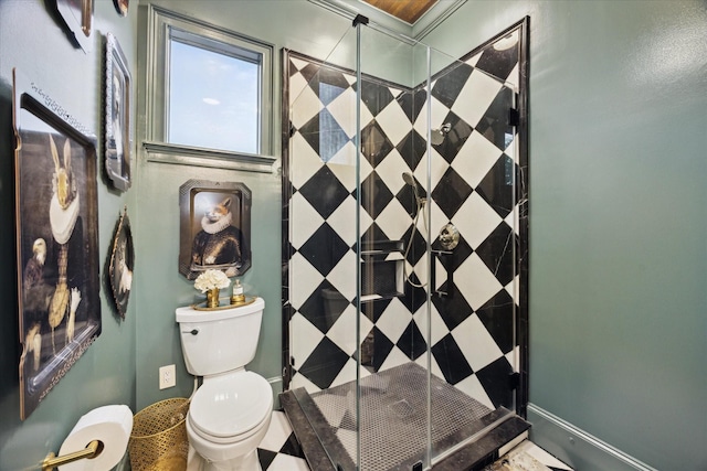 bathroom with a shower and toilet