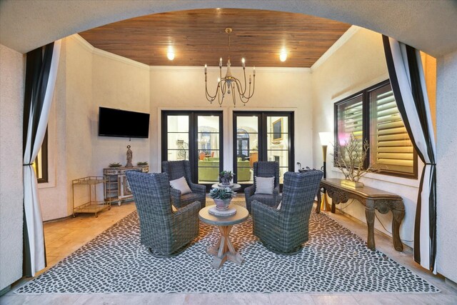 interior space featuring a chandelier, french doors, crown molding, and wood ceiling