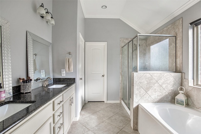 bathroom featuring crown molding, tile patterned flooring, vanity, and vaulted ceiling