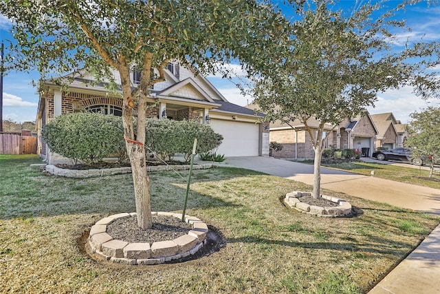 view of front of property with a front yard and a garage